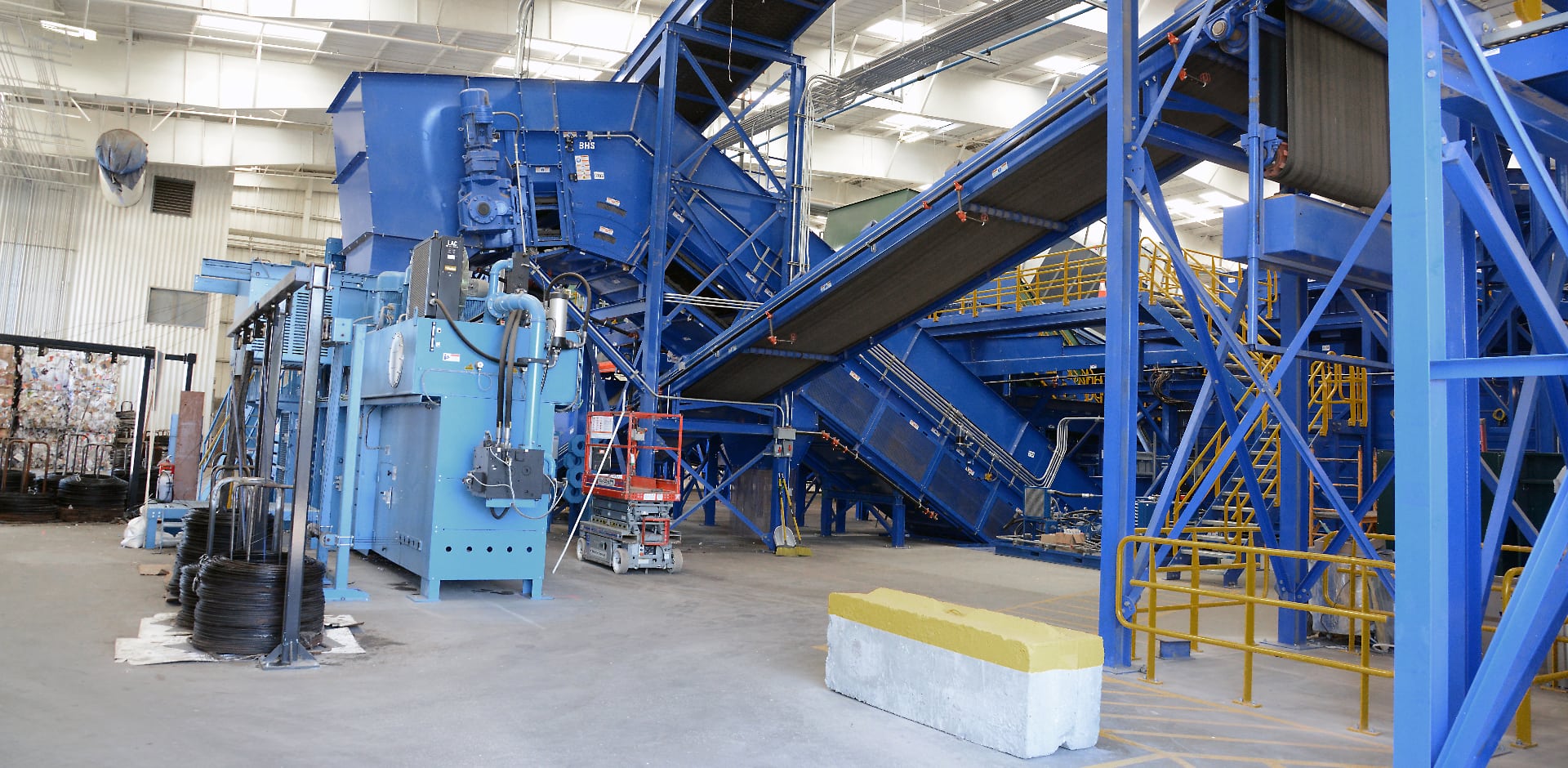 Photo Of A Warehouse With Large Blue Industrial Equipment
