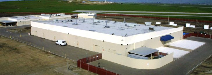 aerial view of the outside of a warehouse facility.